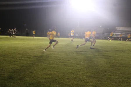 Rapid River football holds midnight practice